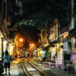 Malavika Mohanan Instagram - #TravelReminiscing part 1: Vietnam 🇻🇳 • • 1. Sitting at a makeshift cafe on a railway track at ‘train street’ in Hanoi, where are the tables and chairs are immediately pulled back and cleared up for the train to pass a couple of minutes before the train is due to arrive. A little nerve wrecking the first time you experience it, but definitely worth experiencing 🛤 2. The ‘train street’ in Hanoi at night 🚂 3. ‘Egg coffee’ which is a Vietnamese speciality. Sounds pretty gross at first, but it’s super yum! Tastes like liquid cake 🍰 4. The streets of ‘Hoi An’, also known as the ‘lantern city’. The streets of this little town are lit up with hundreds of lanterns every night. My personal favourite little town out of all places I visited in Vietnam 🏮 5. A bustling and colourful restaurant/pub in ‘Hoi an’ 🍷 6. Resting for coffee breaks after the long walks ☕️ 7. Vietnam has the cutest doggos ever! 🐶 8. Afternoon nap at a waterfall, anyone? ⛲️