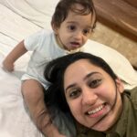 Miya George Instagram - Why does any baby need fancy toys when the mama has beautiful hair, nose & earrings 🤷‍♀️