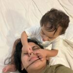 Miya George Instagram - Why does any baby need fancy toys when the mama has beautiful hair, nose & earrings 🤷‍♀️