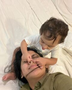Miya George Instagram - Why does any baby need fancy toys when the mama has beautiful hair, nose & earrings 🤷‍♀️