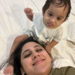 Miya George Instagram - Why does any baby need fancy toys when the mama has beautiful hair, nose & earrings 🤷‍♀️