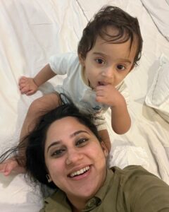 Miya George Instagram - Why does any baby need fancy toys when the mama has beautiful hair, nose & earrings 🤷‍♀️