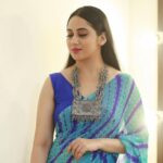 Miya George Instagram - Authentic North Indian Bandhani Saree in blue & blue combination is cool I feel.. what do u guys think? 🥻Saree from @pothyskerala Styling @sabarinathk_ Jewelry @seeruscollections Makeup @femy_antony__ 📸 @pranavraaaj