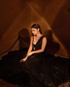Mouni Roy Instagram - The soul should always stand ajar, ready to welcome the ecstatic experience. 🖤 • • • • Outfit by :@sawangandhiofficial Jewellery by : @farahkhanworld Styled by :@manekaharisinghani for @stylebalmco Hair by : @chettiarqueensly Makeup by : @mukeshpatilmakeup Shot by : @tejasnerurkarr @zeetv #didlilmasters