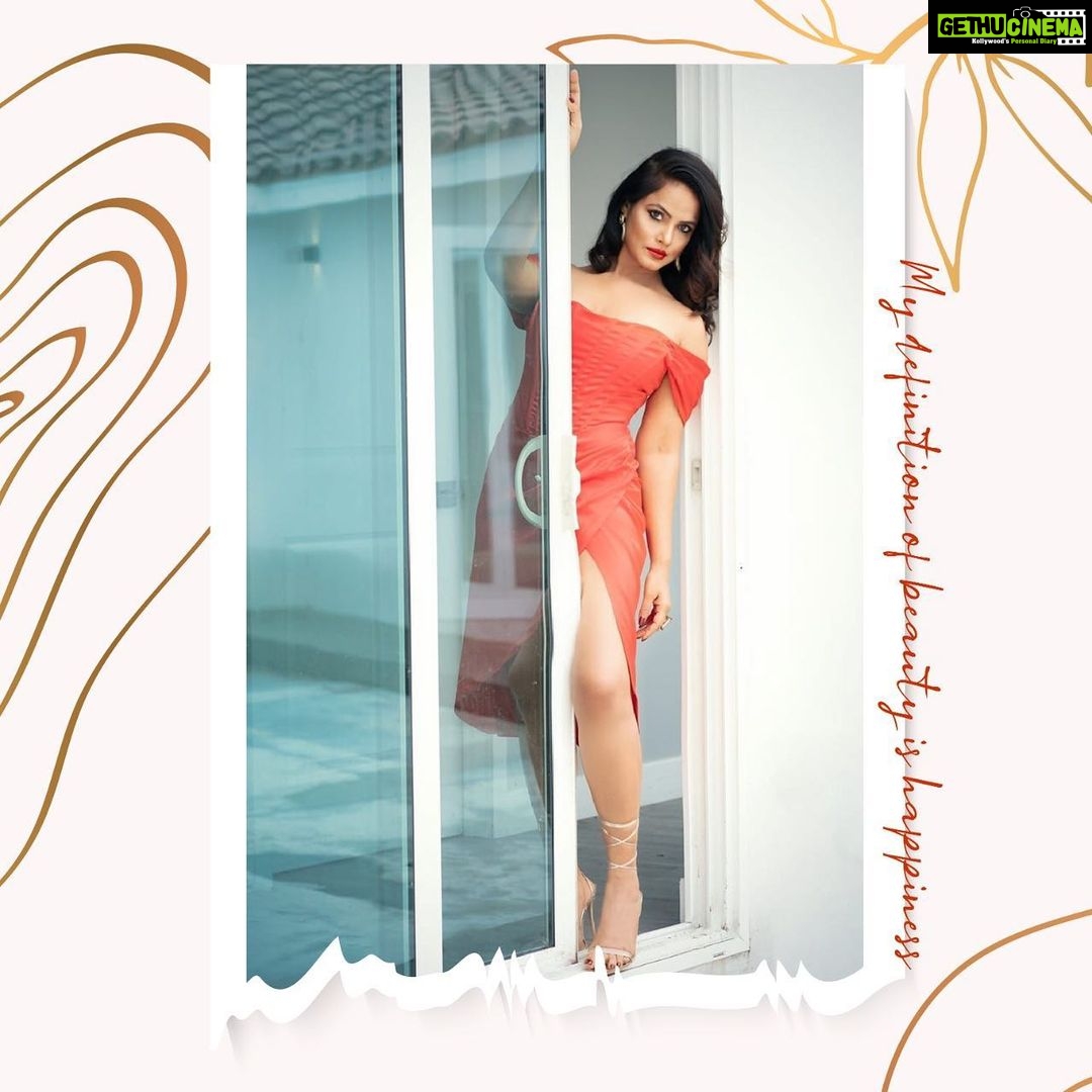 Neetu Chandra Instagram - I am like a fire in my soul always strong. . . #beautiful #strong #strongwomen #orangedress #modelshoot #posing #pose