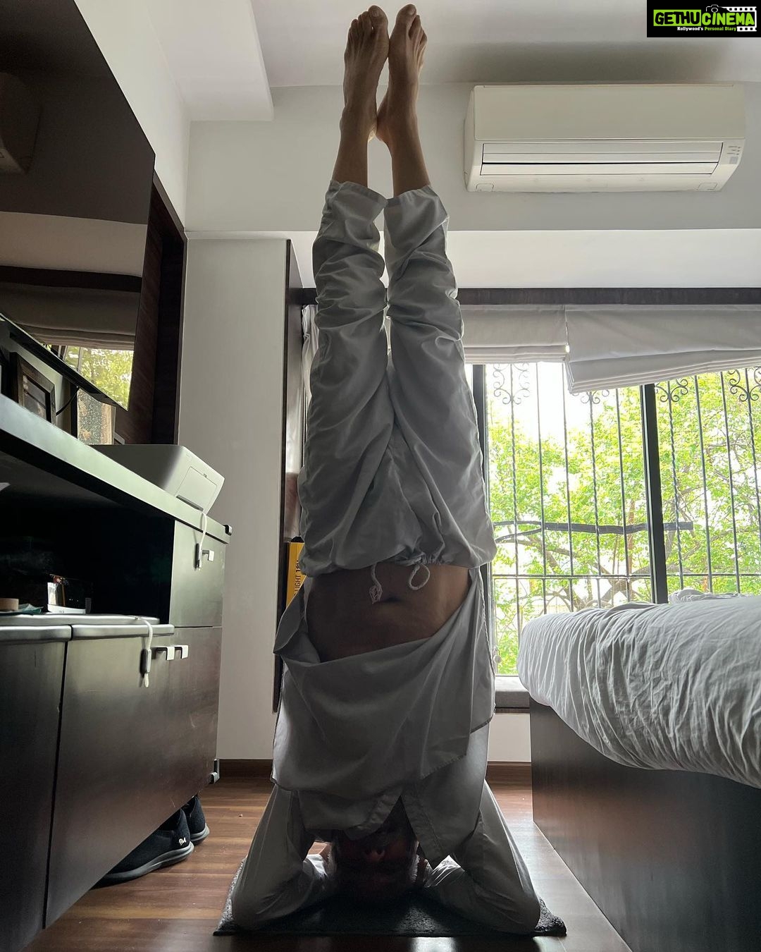 Neha Dhupia Instagram - I get it from my father … his daily practice and me practising everyday … #shirshasana … thank you @rohitflowyoga for the gyaan and dhyaan … #internationalyogaday