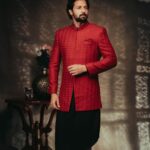 Santhosh Prathap Instagram - Deep red Sherwani with Asymmetrical Kurta. Can be customised to any colour of your choice. Models: @santhoshprathapoffl @vekkey @kamurudin Photo: @thevenkatbala Creative & stylist: @jenson16 Makeup: @touchofandy Menswear: #Singarajah Production executive: @durai_making_moves_ Gaffer: @gopal_gaffer . . . . . . . . #Singarajah #SingarajahMenswear #WearingSingarajah #TheMadrasGang #indianwedding #Groomwear #Menwithclass #Cocktailedit2022 #Santhosh #Sarpatta #SarpattaParambarai #Groomsofsingarajah #Bespoke #Madetomeasure #Sherwani #Kurtaformen #Tamilwedding #SingarajahShoes #Formalshoes #Veshti #Cocktailwear #Groomsinspiration