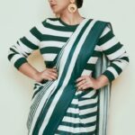Vidya Balan Instagram - My brief to my stylists? Quite simple… Make it a saree. But make it stunning ✨ Sarees - @raw_mango & @houseofurrmi Makeup - @harshjariwala158 Hair - @bhosleshalaka Nails - @diya.nailart.loom Styling - @who_wore_what_when