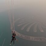 Ahana Kumar Instagram - So on this day , the Sunrise was at 5:33 AM , and I jumped off that plane at around 5:45 AM :) Feeling like a bird , flying in the sky watching a beautiful sun-rise , amidst clouds and above a city filled with sky-scrapers … my heart was filled with happiness , adrenaline and gratitude. Ah , what a moment ✨ Ofcourse I made a Vlog. It’s on the Channel. Watch me jump out a plane in slow-motion. Link in Bio and Stories😋✈️💫🤍🫶🏻 Dubai