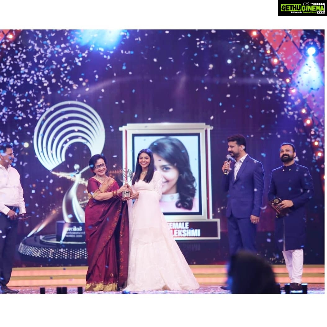 Aishwarya Lekshmi Instagram - #Mazhavilentertainmentawards2019 Gratitude π Big thanks to my dearest directors @amalneerad_official & @director_jis_joy_ for giving me two wonderful films i will remember until my last breath; my two brilliant co actors , & i share the star pair award with Asif ikka ; and our technical team ,cast and crew of both films. And Forever indebted to our audience for all the love given to both my films and me this past year. Thankyou for dressing me up in my every favourite whites! @suresh.menon Choker : @rimliboutique