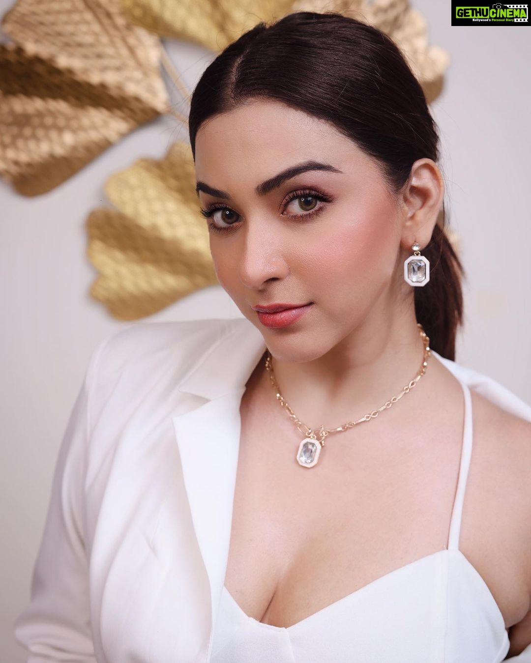 Eshanya Maheshwari Instagram - White on white 🤍✨ 📸- @portraitsbyvedant Blazer and pants - @atticsalt___ White crop top - @zara White heels- @mango earrings and necklace set - @accessorizeindiaofficial Golden clutch- @accessorizeindiaofficial #white #suit #fashion #style #fashionmodel #styleblogger #esshanyamaheshwari #eashanya #poser #instafashion #instastyle