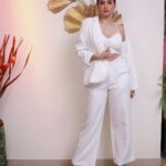 Eshanya Maheshwari Instagram - White on white 🤍✨ 📸- @portraitsbyvedant Blazer and pants - @atticsalt___ White crop top - @zara White heels- @mango earrings and necklace set - @accessorizeindiaofficial Golden clutch- @accessorizeindiaofficial #white #suit #fashion #style #fashionmodel #styleblogger #esshanyamaheshwari #eashanya #poser #instafashion #instastyle