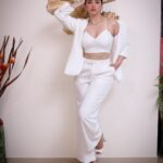 Eshanya Maheshwari Instagram - White on white 🤍✨ 📸- @portraitsbyvedant Blazer and pants - @atticsalt___ White crop top - @zara White heels- @mango earrings and necklace set - @accessorizeindiaofficial Golden clutch- @accessorizeindiaofficial #white #suit #fashion #style #fashionmodel #styleblogger #esshanyamaheshwari #eashanya #poser #instafashion #instastyle