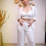 Eshanya Maheshwari Instagram - White on white 🤍✨ 📸- @portraitsbyvedant Blazer and pants - @atticsalt___ White crop top - @zara White heels- @mango earrings and necklace set - @accessorizeindiaofficial Golden clutch- @accessorizeindiaofficial #white #suit #fashion #style #fashionmodel #styleblogger #esshanyamaheshwari #eashanya #poser #instafashion #instastyle