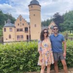 Evelyn Sharma Instagram - Love a good murderous swan 🦢 story at an old German castle 🏰 lol Mespelbrunn Castle has always been a favourite place of mine to visit when I’m in my hometown 💖 even better with dear friends! 👯‍♀️ #schlossmespelbrunn #aschaffenburg #germany #spessart