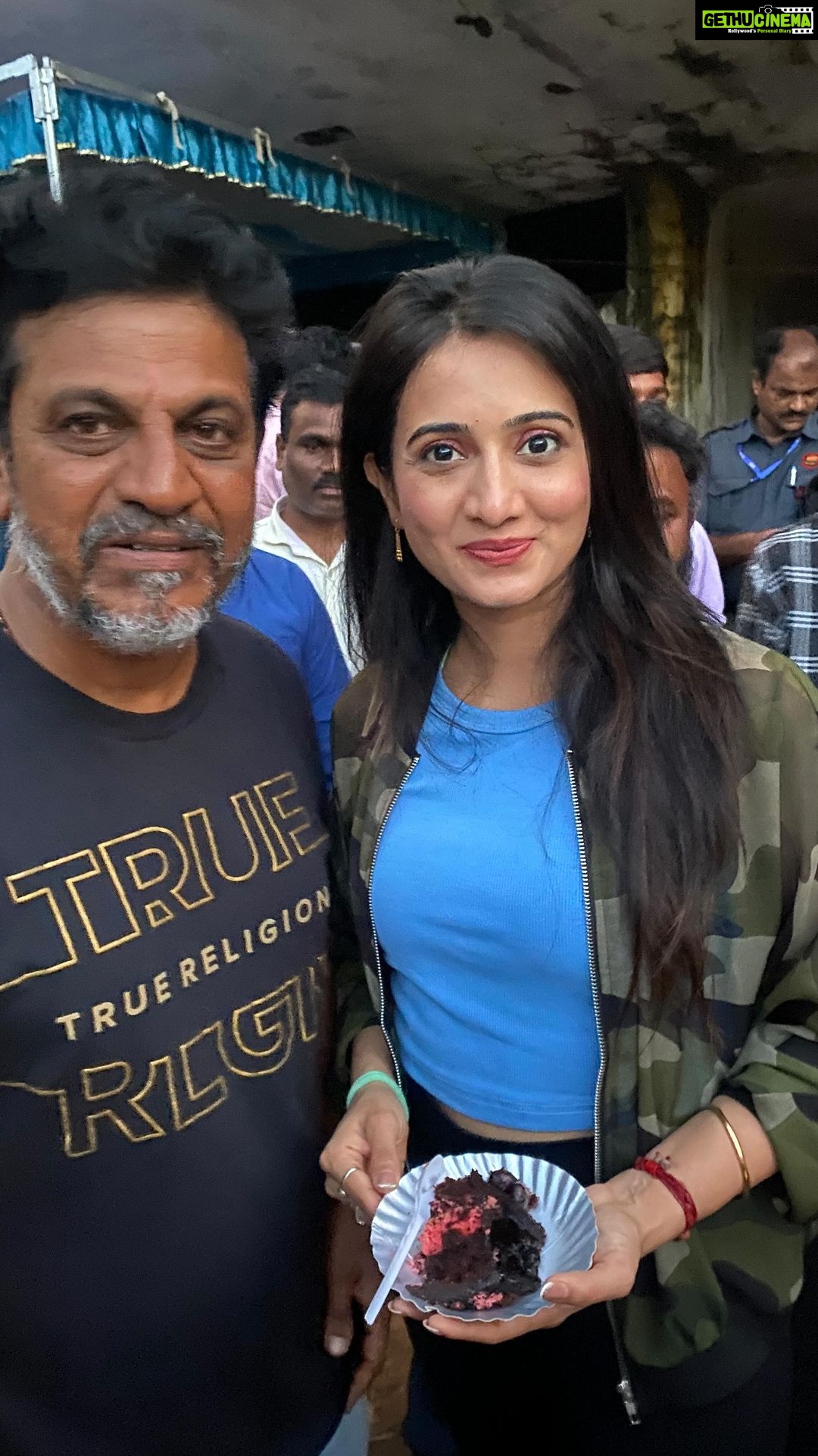 Harshika Poonacha Instagram - My version of #rhythmofshivappa , So humbled to be meeting the legend #Shivanna after a long time, We were shooting in the same location and I was so happy to know Shivanna was around and ran to meet him . Keep rocking Shivanna . Happy birthday to the most talented singer and now actor @adithiii_sagarrr . Long live sweetheart ♥️ And what an amazing cake from Geetha shiva rajkumar ma’am , It was yummm, Thankyou for sending me a cupcake home superstar director @nimmaaharsha master. It was delicious. Also Thankyou for having me over the #vedha sets, it was an experience to be remembered and I’m sure people will have the same experience while they watch the movie #vedha . Keep rocking 🥰 Lots and lots of love 💕
