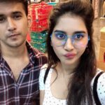 Nabha Natesh Instagram – Heyyy !!!!! We agreed on goofy faces 🙄 
@nahushachakravarthi worst brother 😓
.
.
.
.

PS: u are going to see a lot of those blue frames 👓 also we dint go to buy those colourful bottles 😬just bot a black one☺️