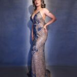 Neha Bhasin Instagram - Pleased to tell you I am awarded Style Icon 2022 at the International Iconic awards ❣️ I still remember topping leading magazines what not to wear list, or being mocked by leading blogs whose only soul purpose was to mock women on red carpets. As a 19 year old i have hidden newspapers on flights that circled my sweat patches at an event highliglighting them serving as a side serve for morning flight passengers. Even my own often felt my dress sense was atrocious or too much. Well i wore faux leather to college 😅 and wore orange with yellow way before colour blocking was a fad. I have remained the Same Neha for who fashion has been a fantasy world of fun, art and expression just that today i have access to better clothes etc. The world is slowly relenting and handing me the crown I was already wearing 😋🤗 Dress @labelambrosiacouture Hair @salon_muah #nehabhasin #fashionista #trendsetter