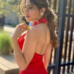 Nikki Tamboli Instagram - "If you think I look good, don't think. Know.” 🔥🔥 . . . . . . . . . . . . . . H&M : @puneet_makeovers Outfit : @gnama.in Jewellery : @zevarking Styled by : @ruchikapoor . . #nikkitamboli #red #love #naturallight #sunkissed #sunnyday #dubai ♥️♥️
