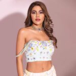Nikki Tamboli Instagram - 🧚🏻‍♀️ Shoot for @fablookmagazine Styled by @milliarora7777 Assisted by @stylescape__ @mininarula02 Wearing @simplesassybyjappyminty Jewels by @dv_diamondvilla Bracelets @worldofelevate Mua @smridhimehtamua Hair @nadeem.artist Shot by @shutterstrings Publicist - @planetmediapr . . . #nikkitamboli #instafashion #lehenga #style #traditional #love