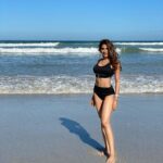Nikki Tamboli Instagram - You’re the only fish in the sea for me 🐬🌊 #beach #summer #tanned #shoot #beachlife #ocean #sea #paradise #happy #beachyhair #capetown #southafrica #kkk11 South Africa cape town