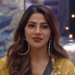 Nikki Tamboli Instagram - Sparkling up the evening in a beautiful yellow attire and her smile! 💖 Fashionista #NikkiTamboli is a perfect combination of fabulous and facile. 🤩 . Outfit : @kalkifashion Earrings : @bellofox Styled by : @officialanahita . . @colorstv @endemolshineind @vootselect #TeamNikki #TamboliKiToli #NikkiIsTheBoss #BiggBoss2020 #BB14 #NikkiRulingBB14 #colorstv #BiggBoss14 Mumbai, Maharashtra