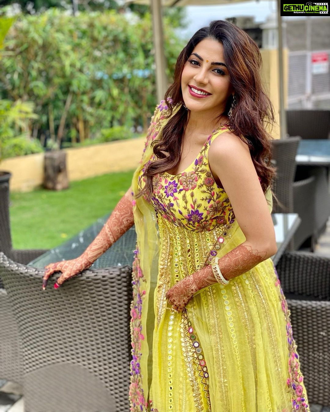 nikki tamboli yellow lehenga