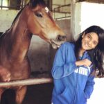 Nivedhithaa Sathish Instagram - Warming up with my partner! Looks like he already loves me, Cutie Spartan! we shall win the race soon bud 💕 Bangalore Turf Club