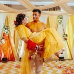 Payal Rohatgi Instagram - Bride: @payalrohatgi Groom: @sangramsingh_wrestler Haldi function outfit: @irum.in Photographer: @movieingmoments Mua: @makeupbychandanbhatia Arranged by: @shaadijitters Travel partner: @mvtsindia @holidaysbymaitri24 Floral Jewelry: @dulhanama Decor: @kps__events_ Venue: @jaypeehotels Wedding Ideation: @anupma543 @payalrohatgi is our custom made chiffon lehenga with haldi dyed chanderi kurta with mirror work border for the haldi function #PayalRohatgi #payalrohatgi #sangramsinghwrestler #payalkesangram #payalsangramwedding #weddings2022 #weddingseason #shadidiaries #handcrafted #haldioutfit #haldidye #congratulations #happycouple