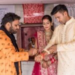 Payal Rohatgi Instagram - As a married couple our first blessings at Temple Pancheshwar Mahadev in Agra. It’s located at the East gate of TajMahal. Visit that before u go visit Taj 🙏 #payalrohatgi #sangramsingh #payalkesangram 📸 : @movieingmoments Travel Partner : @holidaysbymaitri24 @mvtsindia Decor : @kps__events_ Wedding ideation : @anupma543 Payal’s Outfit : @_risaofficial @house_of_risa_ @wfivecommunication Payal’s jewellery : @multanijewellersofficial Sangram’s outfit : @asopalav