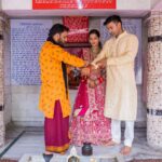 Payal Rohatgi Instagram - As a married couple our first blessings at Temple Pancheshwar Mahadev in Agra. It’s located at the East gate of TajMahal. Visit that before u go visit Taj 🙏 #payalrohatgi #sangramsingh #payalkesangram 📸 : @movieingmoments Travel Partner : @holidaysbymaitri24 @mvtsindia Decor : @kps__events_ Wedding ideation : @anupma543 Payal’s Outfit : @_risaofficial @house_of_risa_ @wfivecommunication Payal’s jewellery : @multanijewellersofficial Sangram’s outfit : @asopalav