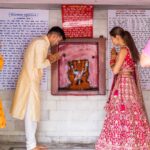 Payal Rohatgi Instagram - As a married couple our first blessings at Temple Pancheshwar Mahadev in Agra. It’s located at the East gate of TajMahal. Visit that before u go visit Taj 🙏 #payalrohatgi #sangramsingh #payalkesangram 📸 : @movieingmoments Travel Partner : @holidaysbymaitri24 @mvtsindia Decor : @kps__events_ Wedding ideation : @anupma543 Payal’s Outfit : @_risaofficial @house_of_risa_ @wfivecommunication Payal’s jewellery : @multanijewellersofficial Sangram’s outfit : @asopalav