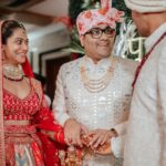 Payal Rohatgi Instagram – Payal Rohatgi giving us classic bridal goals in a magnificent red Kallidorah lehenga.

Her sacred ceremony with Sangram Singh was recently held in Ahmedabad, amidst an esteemed guest list from multiple cities.

While Sangram Singh chose a sophisticated sherwani for the Big-Day, Payal’s mother gorgeously coordinated her red designer saree with the bride’s majestic attire. Each of these outfits were sourced from Asopalav.
We are delighted to be a part of their special day.

📸 @movieingmoments
Outfits : @asopalav
Mua : @makeupbychandanbhatia arranged by @shaadijitters
Normal Jewellery : @multanijewellersofficial
Maang tikka & nose ring : @shirani_legacy
Venue : @jaypeehotels
Travel Partner : @holidaysbymaitri24 @mvtsindia
Decor : @kps_events_
Wedding Ideation : @anupma543

#PayalRohatgi #SangramSingh #ShubhVivah #sangrampayalwedding #weddingphotography #weddinginspiration #couplegoals #india #ahmedabad #indianwedding #celebritywedding #celebritystyle #indianweddingstyle #indianweddinglehenga #lehenga #bigfatindianwedding #brideandgroom #newlyweds #payalSANGram #bigboss #lockupp #lockuppayal #asopalav #asopalavbride #kallidorah #indianstylelehenga #bride