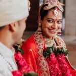 Payal Rohatgi Instagram - Payal Rohatgi giving us classic bridal goals in a magnificent red Kallidorah lehenga. Her sacred ceremony with Sangram Singh was recently held in Ahmedabad, amidst an esteemed guest list from multiple cities. While Sangram Singh chose a sophisticated sherwani for the Big-Day, Payal’s mother gorgeously coordinated her red designer saree with the bride’s majestic attire. Each of these outfits were sourced from Asopalav. We are delighted to be a part of their special day. 📸 @movieingmoments Outfits : @asopalav Mua : @makeupbychandanbhatia arranged by @shaadijitters Normal Jewellery : @multanijewellersofficial Maang tikka & nose ring : @shirani_legacy Venue : @jaypeehotels Travel Partner : @holidaysbymaitri24 @mvtsindia Decor : @kps_events_ Wedding Ideation : @anupma543 #PayalRohatgi #SangramSingh #ShubhVivah #sangrampayalwedding #weddingphotography #weddinginspiration #couplegoals #india #ahmedabad #indianwedding #celebritywedding #celebritystyle #indianweddingstyle #indianweddinglehenga #lehenga #bigfatindianwedding #brideandgroom #newlyweds #payalSANGram #bigboss #lockupp #lockuppayal #asopalav #asopalavbride #kallidorah #indianstylelehenga #bride