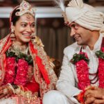 Payal Rohatgi Instagram - Payal Rohatgi giving us classic bridal goals in a magnificent red Kallidorah lehenga. Her sacred ceremony with Sangram Singh was recently held in Ahmedabad, amidst an esteemed guest list from multiple cities. While Sangram Singh chose a sophisticated sherwani for the Big-Day, Payal’s mother gorgeously coordinated her red designer saree with the bride’s majestic attire. Each of these outfits were sourced from Asopalav. We are delighted to be a part of their special day. 📸 @movieingmoments Outfits : @asopalav Mua : @makeupbychandanbhatia arranged by @shaadijitters Normal Jewellery : @multanijewellersofficial Maang tikka & nose ring : @shirani_legacy Venue : @jaypeehotels Travel Partner : @holidaysbymaitri24 @mvtsindia Decor : @kps_events_ Wedding Ideation : @anupma543 #PayalRohatgi #SangramSingh #ShubhVivah #sangrampayalwedding #weddingphotography #weddinginspiration #couplegoals #india #ahmedabad #indianwedding #celebritywedding #celebritystyle #indianweddingstyle #indianweddinglehenga #lehenga #bigfatindianwedding #brideandgroom #newlyweds #payalSANGram #bigboss #lockupp #lockuppayal #asopalav #asopalavbride #kallidorah #indianstylelehenga #bride