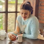 Prachi Deasi Instagram - #Throwback to doing what I do best, devouring coffee in this case which was a heavenly mocha ☕️ in between breaks whilst shooting for #Forensic (which by the way you can watch now on #Zee5 ) in bewitching Mussoorie, reeling in the old world charm of the quaint Landour Bakehouse ☕️🤍🌲 #Coffee moments courtesy @tarikasingh 🫶🏻 PS. swipe for surprise 🐒 #ForensicOnZee5 #Mussoorie #Love #Hills #Mountains #Landour #LandourBakehouse