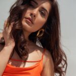 Raashi Khanna Instagram - Think 🍊 is my colour.! #thankyou promotions Silk slip dress by @malie.official Accessories from @misho_designs Styling @jukalker Makeup @makeupartistkarishmabajaj Hair @hairgaragebynatasha 📸 @eshaangirri