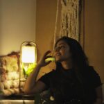 Rajisha Vijayan Instagram - There’s always something special in being captured in your own space. Comfort in abundance. I have been trying my max to accommodate as many indoors plants as possible in my home. And one day I found this beautiful lamp that hosts a live plant in @wildwoods_shwethasheethal page. I love how innovative people are becoming and here is to greener homes 💚