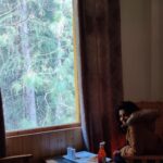 Rajisha Vijayan Instagram - Just before lockdown this was my last trip, planned and executed by @tentgraam ♥️ Day 1: After an overnight journey from Delhi, we woke up to the amazing view of Himalayas. Kasol is a magnificent place for travellers, situated right in Parvati valley, it is a true home for anyone seeking nature and peace. We stayed at this humble cottage amidst pine and apple trees, with a river running right behind it. It is run by a sweet family and their puppy Max is in the third photo. With some delicious food and a cozy weather, I knew this was slowly turning out to be one of my best vacays. @tentgraam you guys make the best trips ever! 🤗 Kasol Parvati Valley