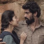 Rana Daggubati Instagram - A one-of-a-kind love story that redefines perseverance and passion. The story of Ravanna and Vennela ❤️🔥 #VirataParvamOnNetflix @ranadaggubati @saipallavi.senthamarai
