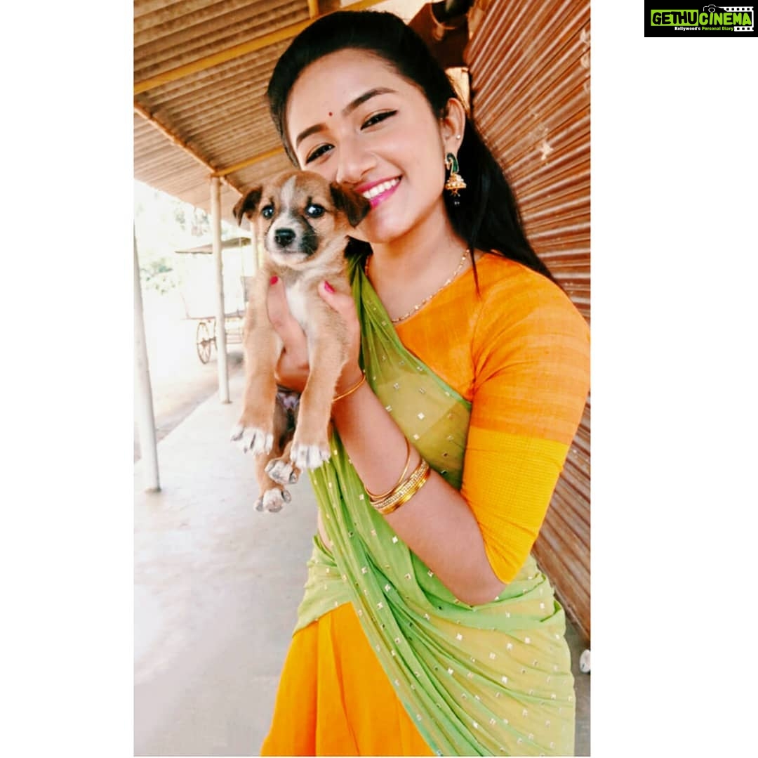 Raveena Daha Instagram - You can't buy happiness, but you can rescue it...puppy love❤️ #raveena #raveenadaha #yellow #green #instagood #cute #puppy #love