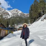 Saniya Iyappan Instagram - Scribblings from my First Solo Trip — Part 2 I've been to Tosh before, during summer. It was nothing like what I had seen in winter. The valley painted itself with a vibrant white hue. Being all by myself amongst these snow-clad mountains in this picturesque valley brought an enormous amount of indescribable feelings. The two-hour trek from Tosh to Kutla would've been a dreadful experience if it hadn't been for the amazing Gappuji and Amrit Ji. I know them from my previous expeditions with Tentgram. Even though it wasn't the first time I received their hospitality, meeting and interacting with them during my first solo trip was an entirely different experience. When the freezing wind shivered every inch of my body, their warm hospitality made me endure all the hardships and finish my trek successfully. There were moments I thought I wouldn't be able to make it, but the sheer positive energy radiated by Gappuji kept me going. He sang folk songs and cheered me up every time he thought I was feeling slightly low. Team Tengram was of great help during this trip. They took some great efforts to ensure that everything went pretty smooth on my first solo trip. As a lone girl traveller, I had many apprehensions regarding safety, but Tentgram made it all feel like a breeze. If it hadn't been for such amazing people like Gappuji and Amritji, I wouldn't have been able to capture so many memories. I am eternally grateful! @tentgraam 🤍