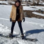 Saniya Iyappan Instagram - Scribblings from my First Solo Trip — Part 3 (Last one, I swear) Gappuji, with his usual charm and infectious laughter, consoled me, "You've done really well for a first-timer". I could find myself struggling to tame the deep snow and even balance myself on the snowboard. But, I had these two beautiful souls — Gappuji and Amritji — who kept pushing me to bring out my best. I've never been an avid adventure seeker, but this newfound spirit was inside me when I tried snowboarding and snow skating. I'm not sure if it was purely because of accomplishing my first solo trip ever. Away from my comfort zone, I was reinventing myself. After repeated attempts, I succeeded. In that scenic backdrop, straight out of a painting, the snow embraced me. The cold winds became a breeze, and I found my balance and cruised through the snow-clad mountains. All I could say is I'm just grateful for having had the privilege of meeting so many people who went out of their way to help me. I'm entirely thrilled after my first solo trip experience and looking forward to many more. Once again, I thank the universe for such a memorable trip. Styling : @asaniya_nazrin Outfit : @mirach_official Himachal Pradesh
