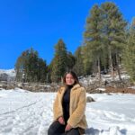 Saniya Iyappan Instagram - Scribblings from my First Solo Trip — Part 3 (Last one, I swear) Gappuji, with his usual charm and infectious laughter, consoled me, "You've done really well for a first-timer". I could find myself struggling to tame the deep snow and even balance myself on the snowboard. But, I had these two beautiful souls — Gappuji and Amritji — who kept pushing me to bring out my best. I've never been an avid adventure seeker, but this newfound spirit was inside me when I tried snowboarding and snow skating. I'm not sure if it was purely because of accomplishing my first solo trip ever. Away from my comfort zone, I was reinventing myself. After repeated attempts, I succeeded. In that scenic backdrop, straight out of a painting, the snow embraced me. The cold winds became a breeze, and I found my balance and cruised through the snow-clad mountains. All I could say is I'm just grateful for having had the privilege of meeting so many people who went out of their way to help me. I'm entirely thrilled after my first solo trip experience and looking forward to many more. Once again, I thank the universe for such a memorable trip. Styling : @asaniya_nazrin Outfit : @mirach_official Himachal Pradesh
