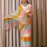 Sarah Khan Instagram - Saree may be a rainbow 🌈 draped in a cloud Smooth and luxurious liquid organza saari in rainbow shade! @laari.official www.laariofficial.com @stylebyhassan @hassanabdullahofficial 📸 @yasser.sadiq_ 💎 @kohar_jewel #laariofficial #Sarahkhan #pakistanifashion #organzasaari #styledbyhassanabdullah
