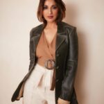 Sonali Bendre Instagram - Wearing this 20-year-old jacket and it’s safe to say… both of us have aged well 😌😉 . . . #Vintage #Reuse #SustainableFashion #UpcycledClothing #OldIsGold #ReuseRevolution