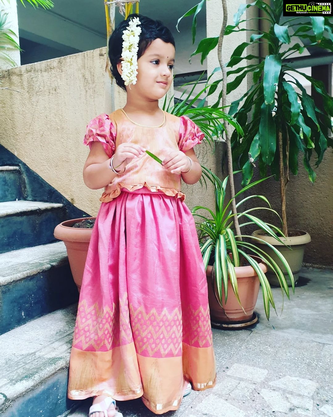 Sruthi Hariharan Instagram - Religion and Traditions. In all honesty all these went away with my father as he left this physical world ... But today, I slowly observe myself trying to incorporate them back in our lives, only cos I want Janki to have a choice . A choice to accept these as a part of her life or not . And that means we take the first step in introducing them to her. Faith - what a beautiful word, what a beautiful state of being! Today was all about how it was with my father . An oil bath in the morning, followed up with wearing a pavadai, pottu and poovu and going to a temple :) Happy Nakshatra porandanaal (star birthday) dear little one . I don't believe you are growing up so fast so soon . #swingingfromthethrees #ourlittlemonkey Special thanks and love to my current obsession @rajeedesignstudio