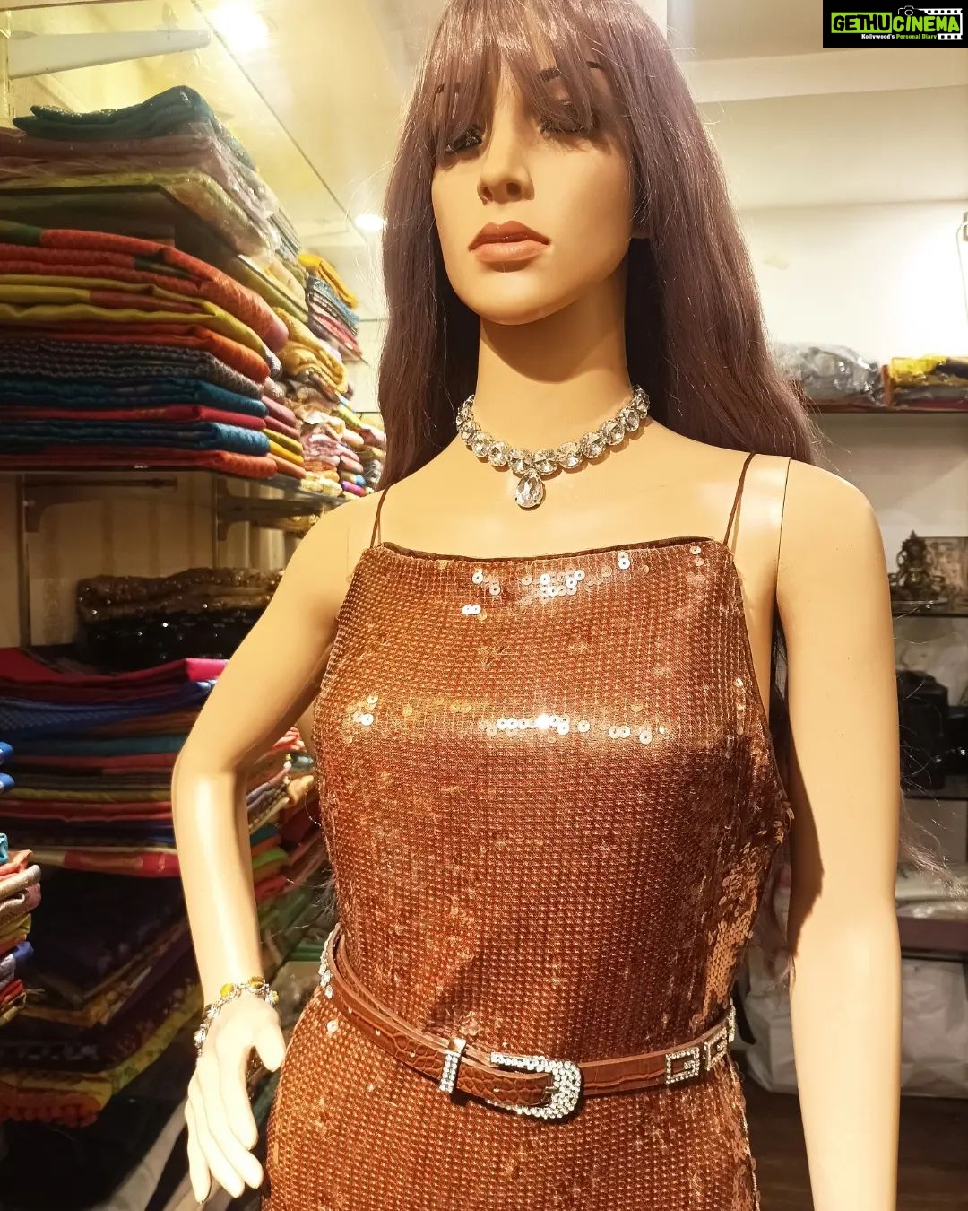 Vanitha Vijayakumar Instagram - Our gorgeous bronze sequin glitter bloom dress will put u in the spotlight with it's sleeveless spaghetti straps with sequins all throughout & knee-length side vent detail✴️ #vanithavijaykumarstyling #outfitoftheday #outfit #outfits #women #womensfashion #girl #girls #style #styling #stylist #fashion #ootd #picoftheday #pictureoftheday #dress #accessories #makeover #onlineshopping #onlineshop #boutique #boutiqueshopping #boutiquefashion Khader Nawaz Khan Road