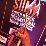 Vignesh Shivan Instagram – ThankYou @siimawards for my first award as a lyric writer 😇 dedicating this award to #NaMuthukumar sir 
Taking the award On behalf of the excellent #karthiknetha @lyricist_vivek & other nominees 😇😇🥳🥳🥳🌟🌟🎉🎉🎉 #lyricwriting #writing #writingcommunity #writers #writersofinstagram #anbaanafans #NaanaThaana #thaanaserndhakoottam #lyrics Lusail Iconic Stadium