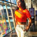 Ashnoor Kaur Instagram - Pray, slay and conquer the day✨🧡 . . #AirportLook #WhatIWore Top by @pankhclothing Pants by @shein_in 📸 by @kauravneet79 #LatePost #Orange #LoveBows #sunkissed #ashnoorstylediaries #goldenhour